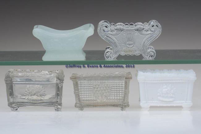 ASSORTED LACY PRESSED SALTS, LOT OF FIVE: ASSORTED LACY PRESSED SALTS, LOT OF FIVE, comprising an opal/opaque white NE-1a, colorless LE-1, NE-3 and OG-2, and an alabaster/clambroth SN-1b. Scarce to very rare. Boston & Sandwich Glass Co. and o