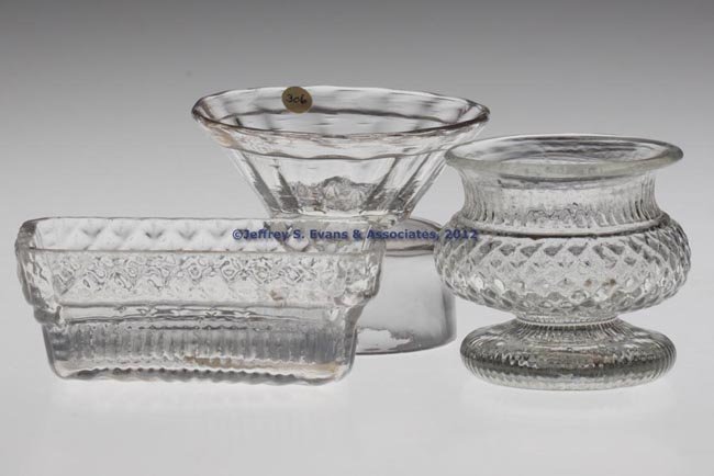 ASSORTED BLOWN SALTS, LOT OF THREE: ASSORTED BLOWN SALTS, LOT OF THREE, colorless, comprising a blown-molded GII-18 footed example, a blow-over and crack-off Diaper Diamond and Ribs example, and a pattern-molded 16-rib pan-form example 