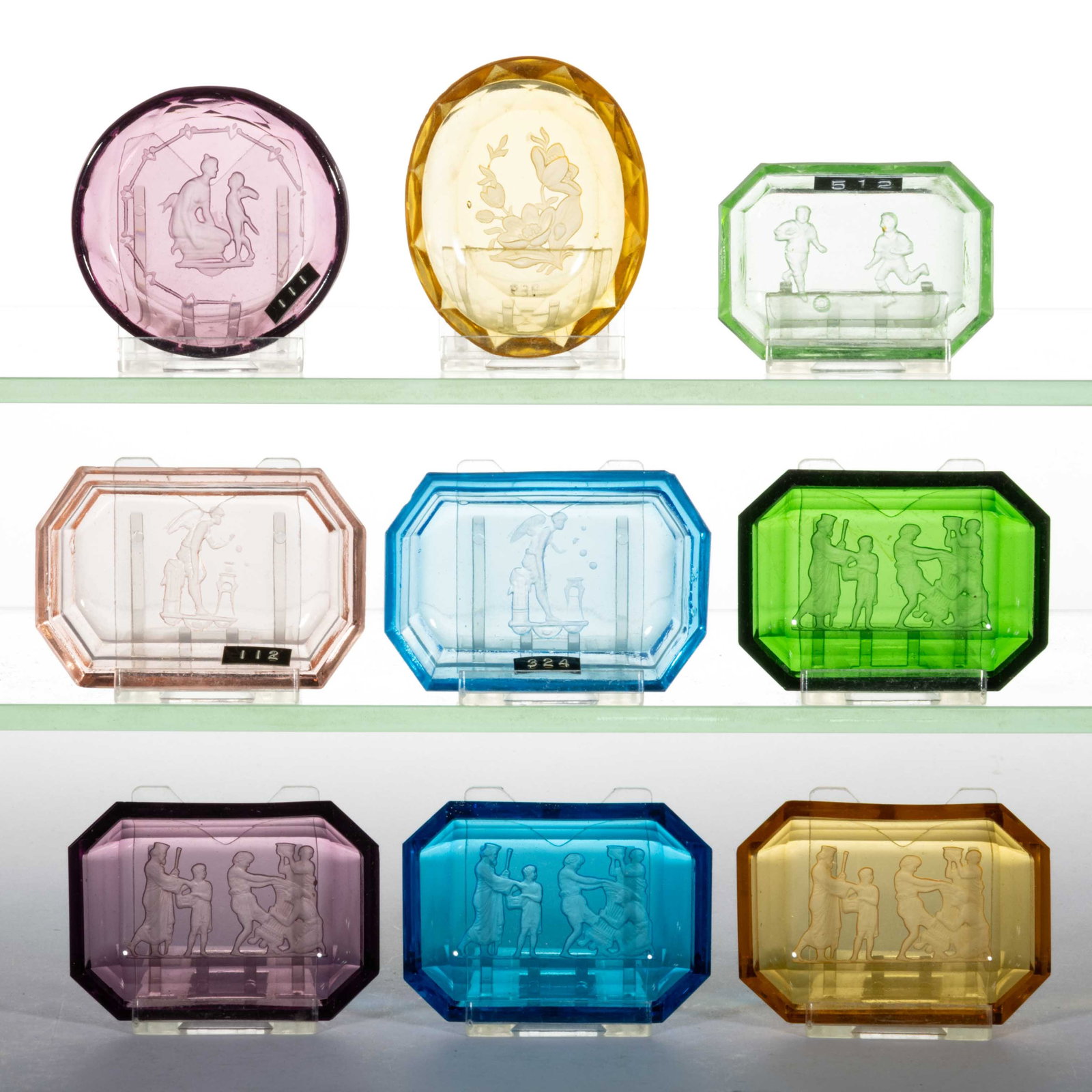 ASSORTED CZECH GLASS OPEN SALTS, LOT OF NINE,: ASSORTED CZECH GLASS OPEN SALTS, LOT OF NINE, various colors, each with a frosted design to the center on the underside, factory-polished rims, four coming in their original box and having a matching 