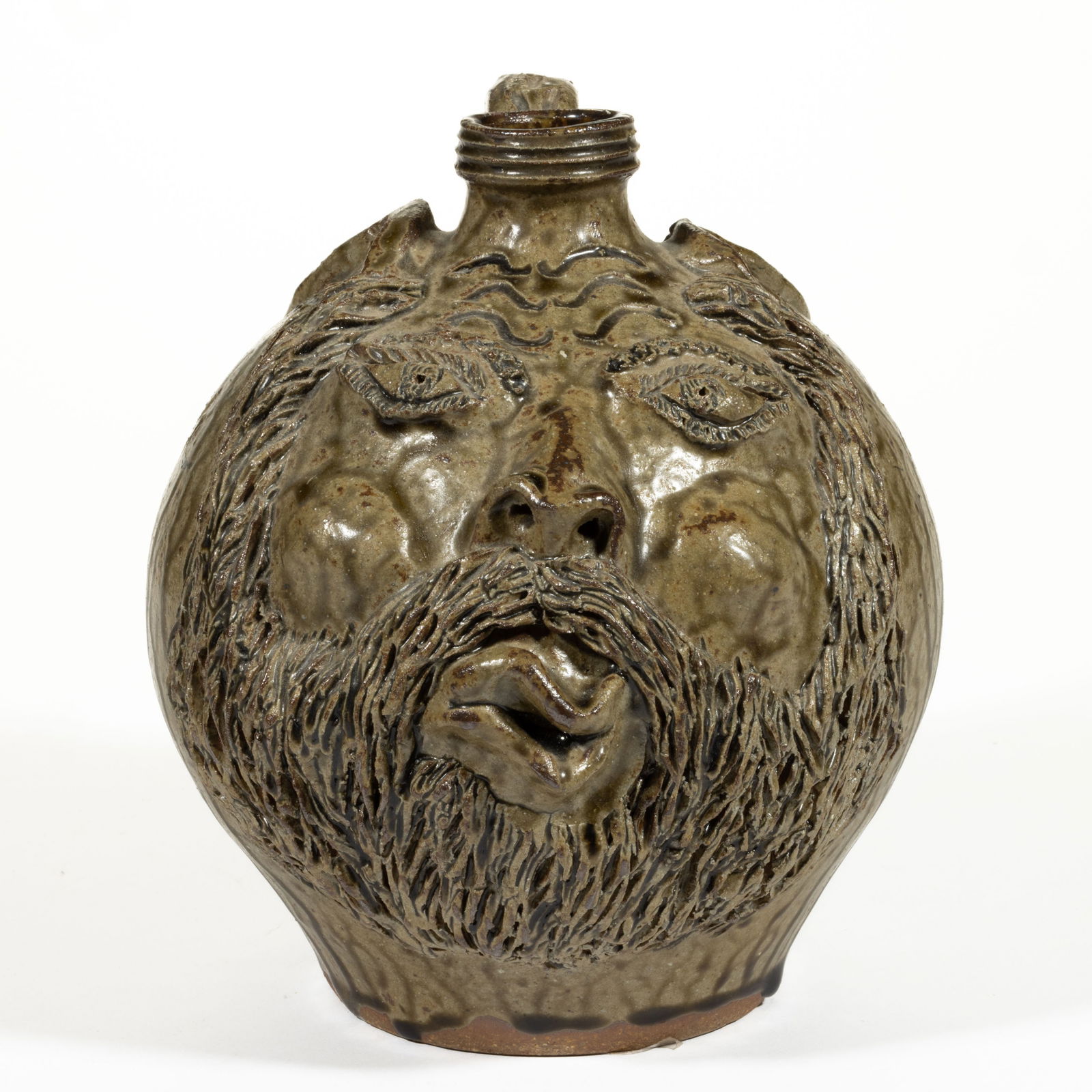 SIGNED BILLY RAY HUSSEY, NORTH CAROLINA EARTHENWARE FACE JUG: SIGNED BILLY RAY HUSSEY, NORTH CAROLINA EARTHENWARE FACE JUG, dripped alkaline glaze, globular form, titled "Roy Thompson / is 40", incised to underside, hand-modeled with applied ceramic ey