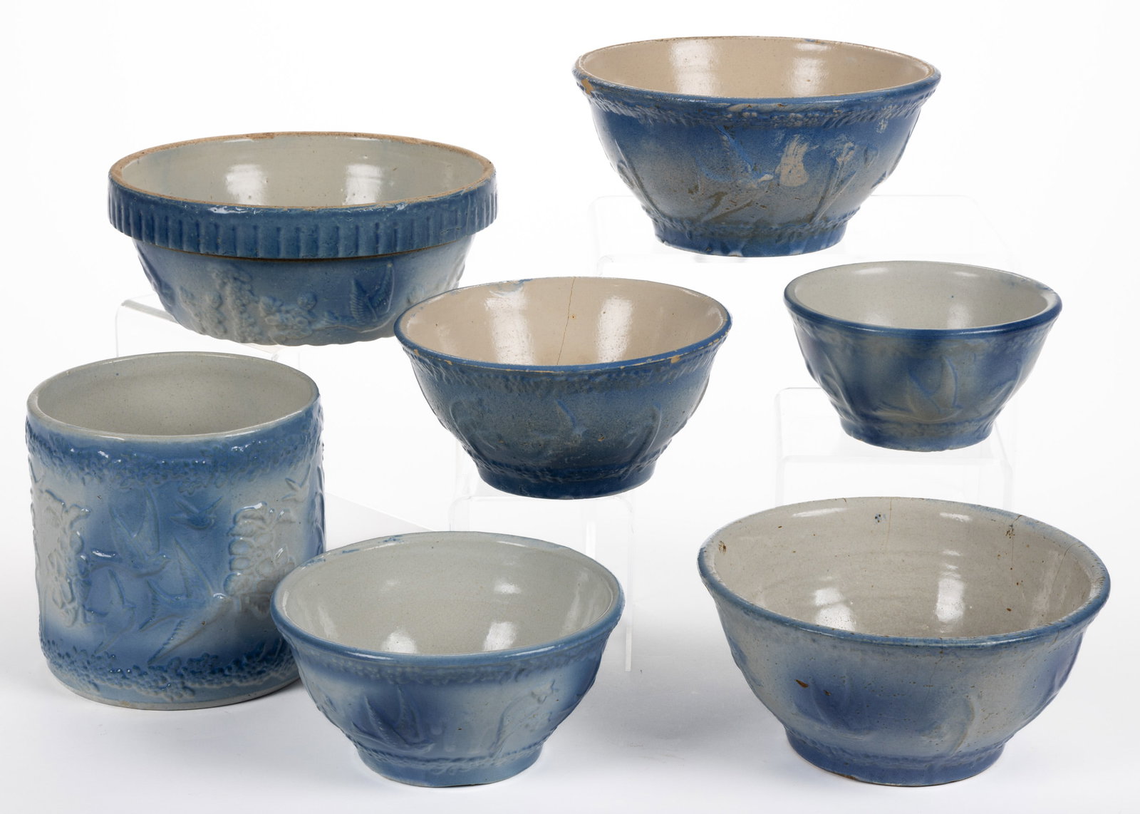 AMERICAN BLUE AND WHITE FLYING BIRDS STONEWARE KITCHEN ARTICLES, LOT OF SEVEN: AMERICAN BLUE AND WHITE FLYING BIRDS STONEWARE KITCHEN ARTICLES, LOT OF SEVEN, comprising a cylindrical-form cookie jar lacking cover, featuring soaring birds flanked by flowers to one 