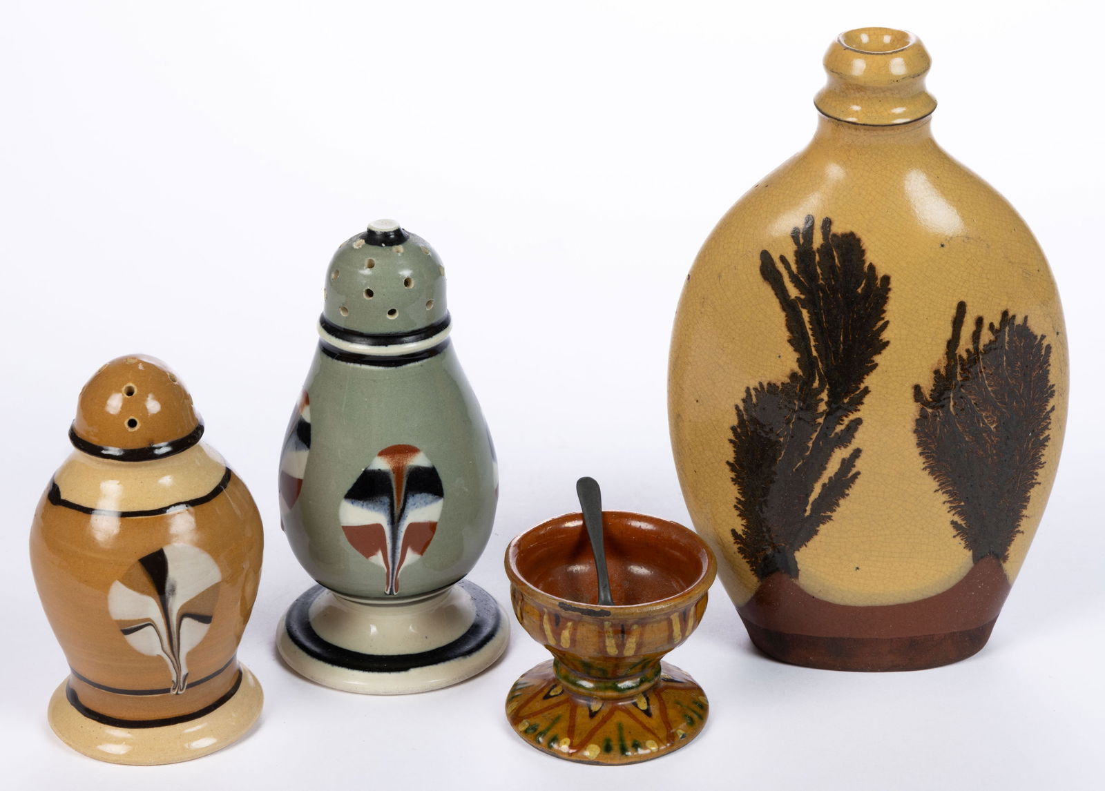 CONTEMPORARY / REPRODUCTION POTTERY ARTICLES, LOT OF FOUR: CONTEMPORARY / REPRODUCTION POTTERY ARTICLES, LOT OF FOUR, comprising three mocha-decorated examples including two sugar shakers/pepper pots featuring tri-colored dipped fan design and a bottle/flask