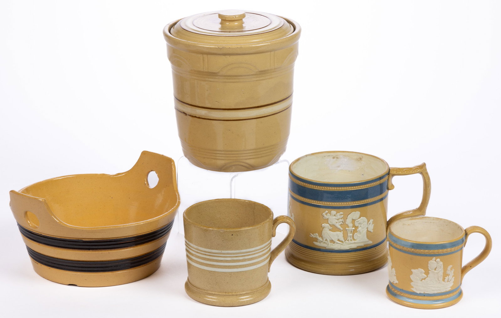 AMERICAN / BRITISH YELLOWWARE ARTICLES, LOT OF FIVE: AMERICAN / BRITISH YELLOWWARE ARTICLES, LOT OF FIVE, comprising two mugs with white sprig molded figural and classical designs and blue-banded decorations, one mug with five white-slip media