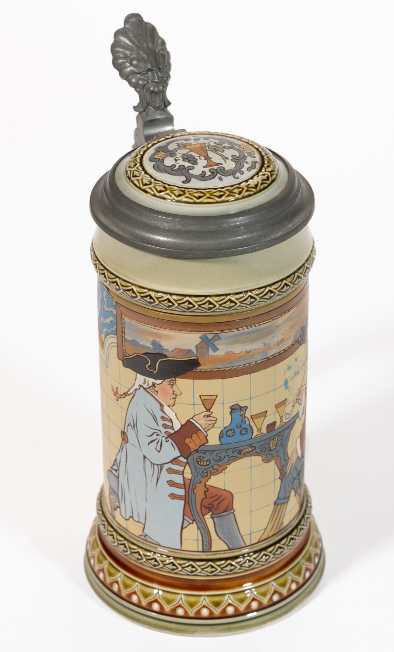 GERMAN METTLACH COLONIAL MEN CERAMIC STEIN: GERMAN METTLACH COLONIAL MEN CERAMIC STEIN, mold number 2752, having etched sides with polychrome hand-painted decorations featuring scene depicting two sitting gentlemen wearing tricorne ha