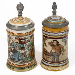 GERMAN METTLACH MUSIC MOTIF CERAMIC STEINS, LOT OF TWO: GERMAN METTLACH MUSIC MOTIF CERAMIC STEINS, LOT OF TWO, mold numbers&nbsp;1995 and 2094, each having etched sides with polychrome hand-painted decorations with ceramic inset lids and metal thumbrests,