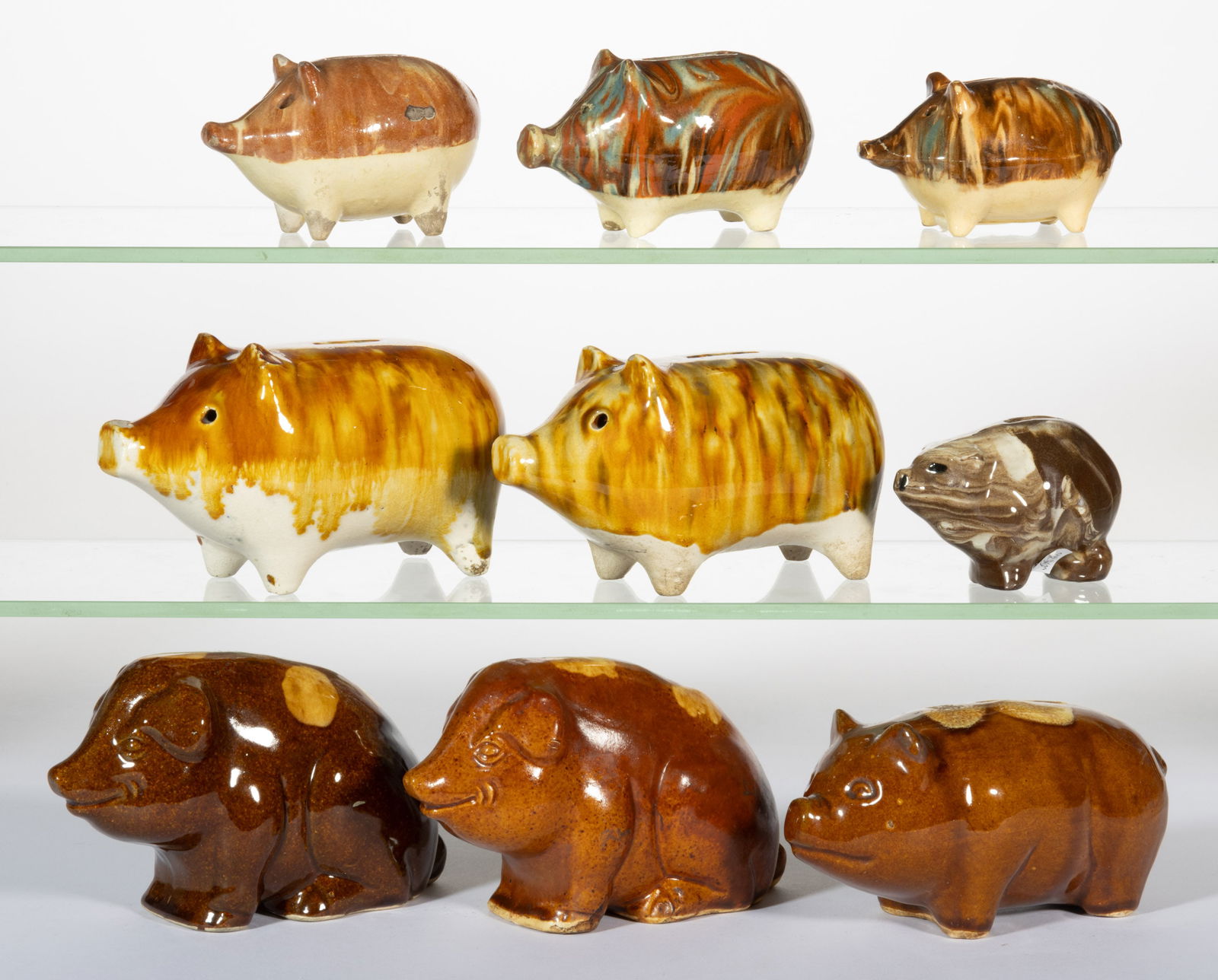ASSORTED CERAMIC PIG FIGURAL MONEY BANKS, LOT OF NINE (1 of 1)