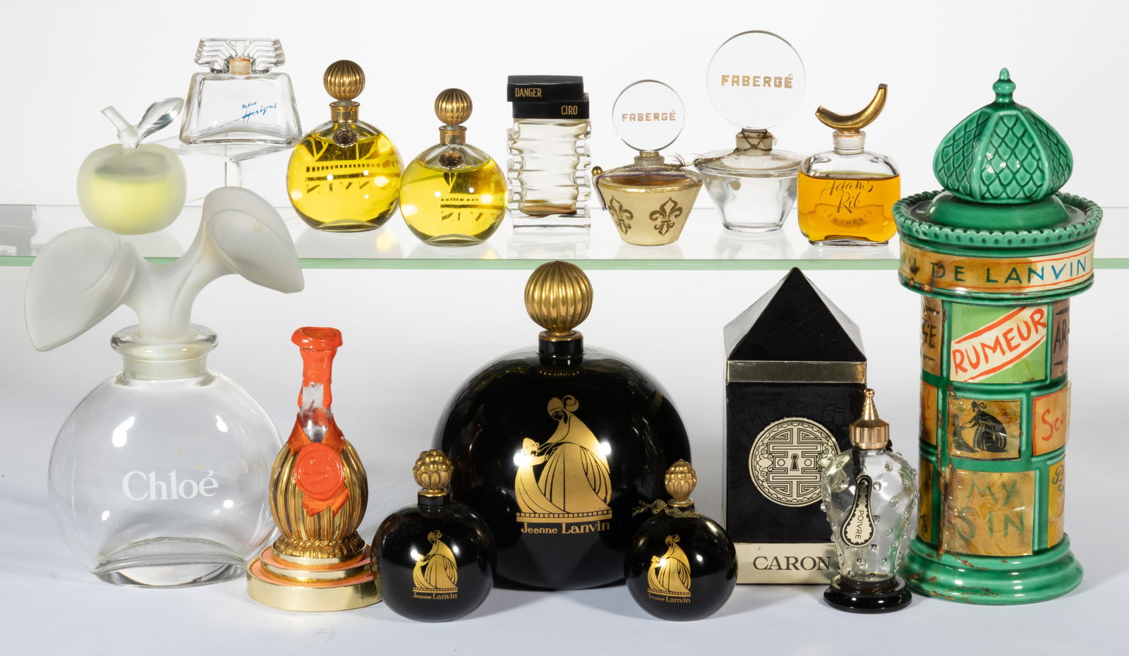 VINTAGE FRENCH COMMERCIAL PERFUME BOTTLES, LOT OF 15: VINTAGE FRENCH COMMERCIAL PERFUME BOTTLES, LOT OF 15, colorless and opaque black, including five Jeanne Lanvin; two Faberge; one Caron Poivre in original box; one Chloe; and a ceramic Lanvin. Most&nbs