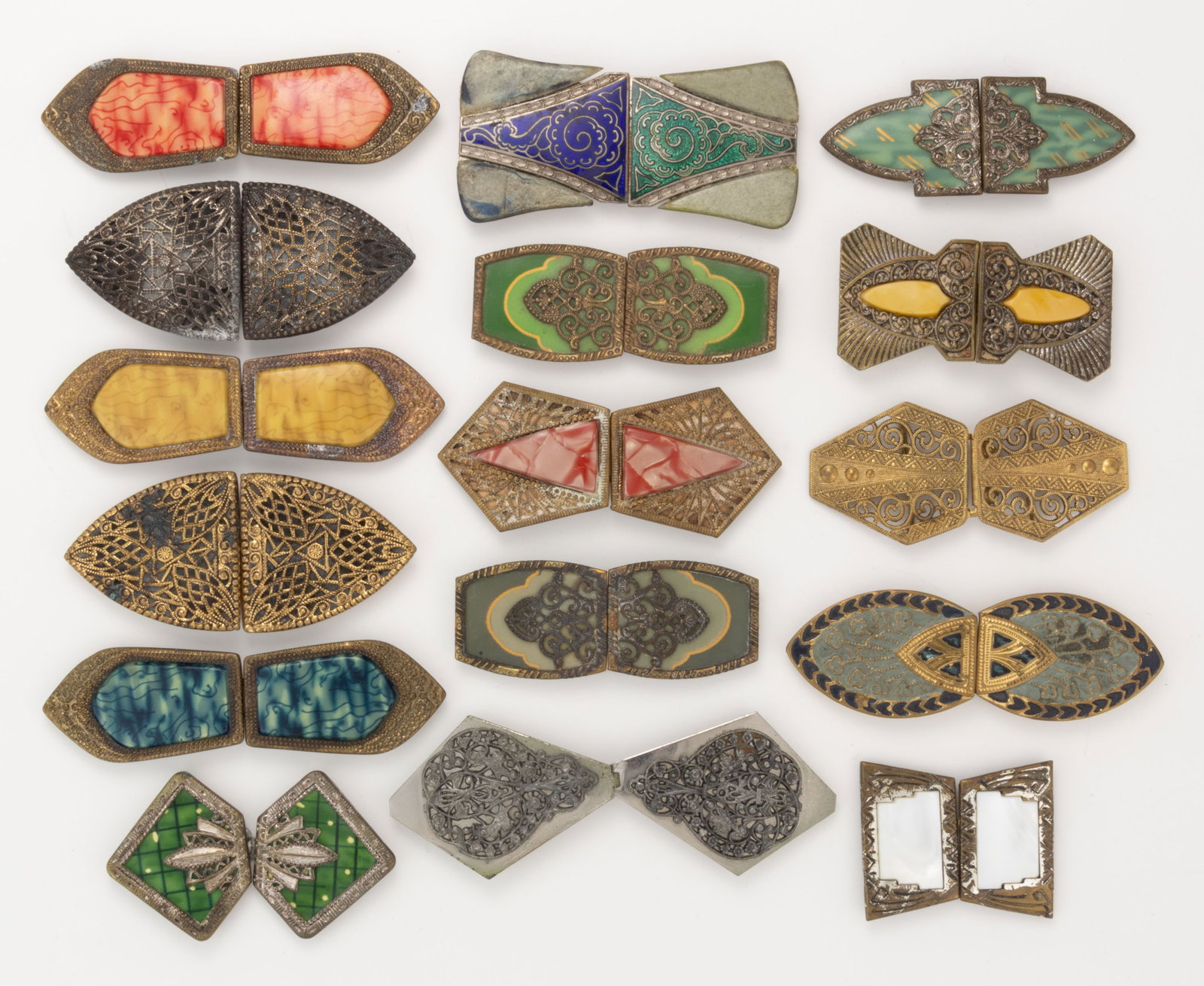 ANTIQUE / VINTAGE CZECHOSLOVAKIAN AND OTHER ART DECO BELT OR DRESS BUCKLES, LOT OF 16: ANTIQUE / VINTAGE CZECHOSLOVAKIAN AND OTHER ART DECO BELT OR DRESS BUCKLES, LOT OF 16, each two-part form having metal frame, comprising nine with celluloid fronts including some having filigree-