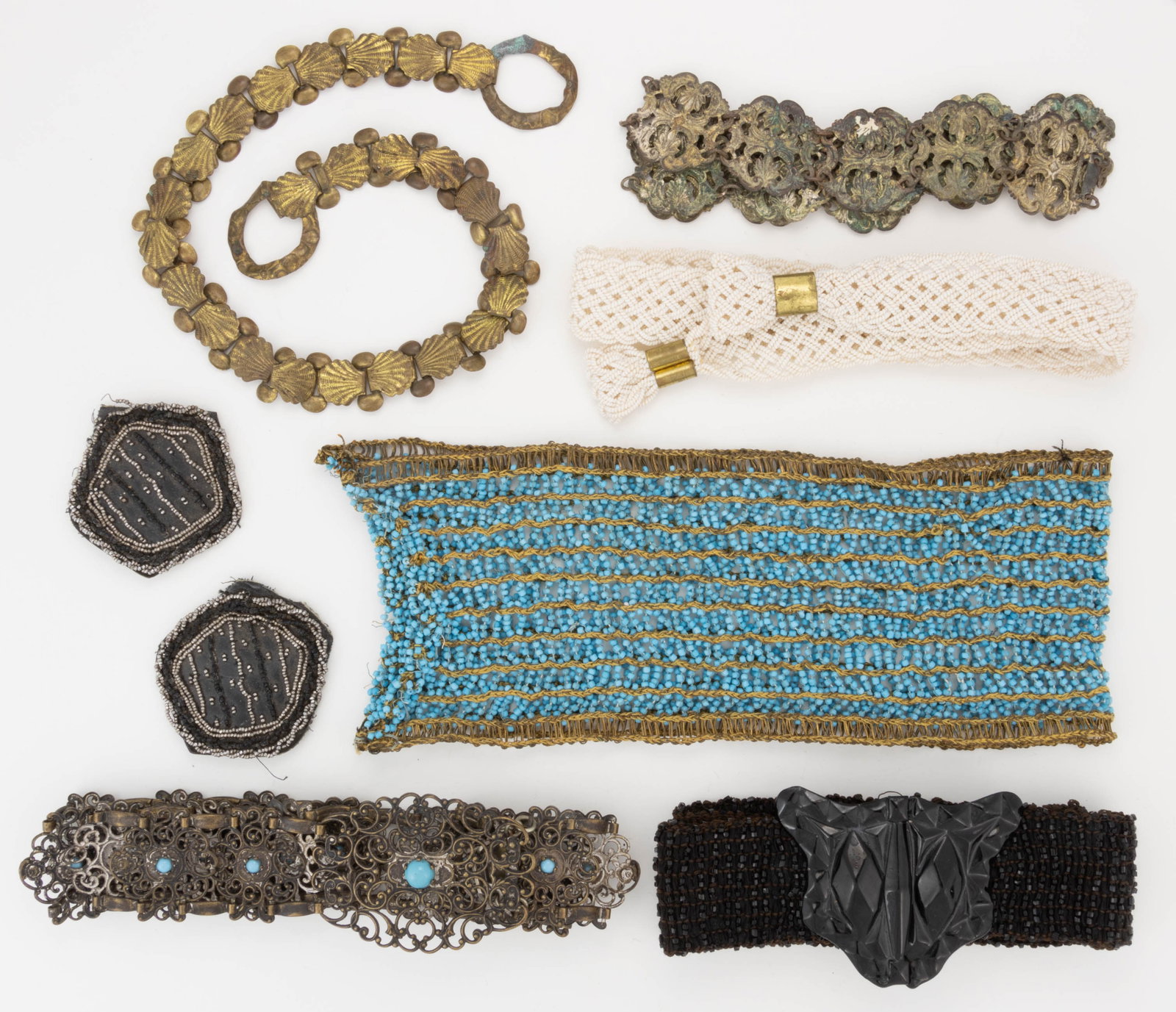 ANTIQUE / VINTAGE BEADED, METAL, AND OTHER BELTS, LOT OF SIX: ANTIQUE / VINTAGE BEADED, METAL, AND OTHER BELTS, LOT OF SIX, comprising two beaded examples consisting of a wide blue-beaded belt with gilt-thread, and a brown belt with black beads an