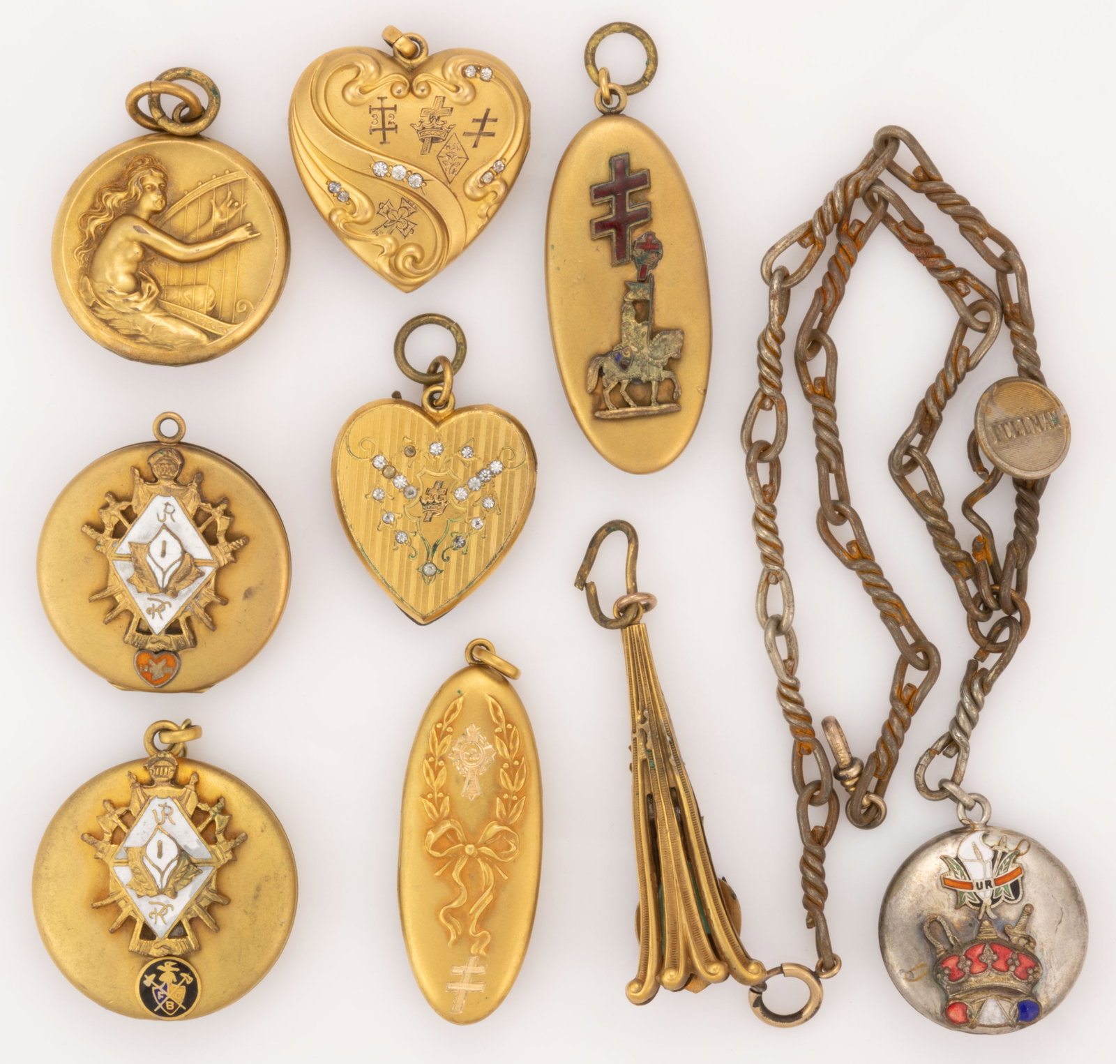 ANTIQUE / VINTAGE KNIGHTS OF PYTHIAS FRATERNAL LOCKETS / WATCH FOBS, LOT OF NINE: ANTIQUE / VINTAGE KNIGHTS OF PYTHIAS FRATERNAL LOCKETS / WATCH FOBS, LOT OF NINE, most pieces gold-filled/toned and one silver-toned, each having two or more applied emblem to one or both sides, 