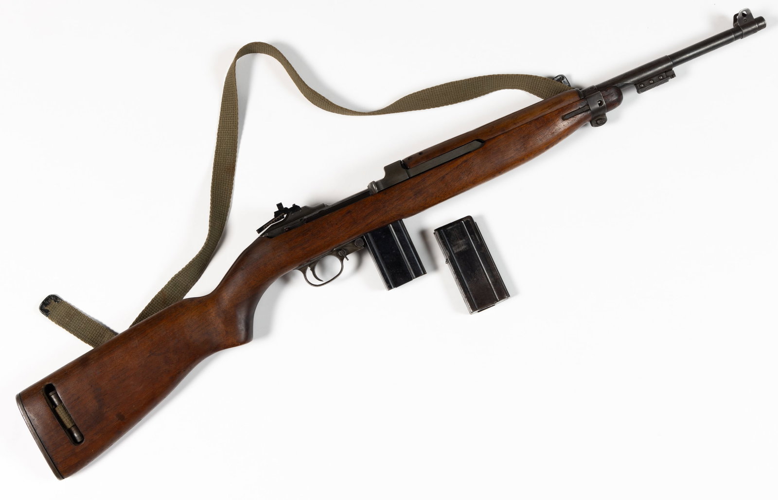 U.S. WORLD WAR TWO / WWII IBM / WINCHESTER M1 CARBINE SEMI-AUTOMATIC RIFLE: U.S. WORLD WAR TWO / WWII IBM / WINCHESTER M1 CARBINE SEMI-AUTOMATIC RIFLE, 30 cal., barrel marked with flaming bomb proof above "W.R.A. / 11-42", barrel band marked "K1", ano