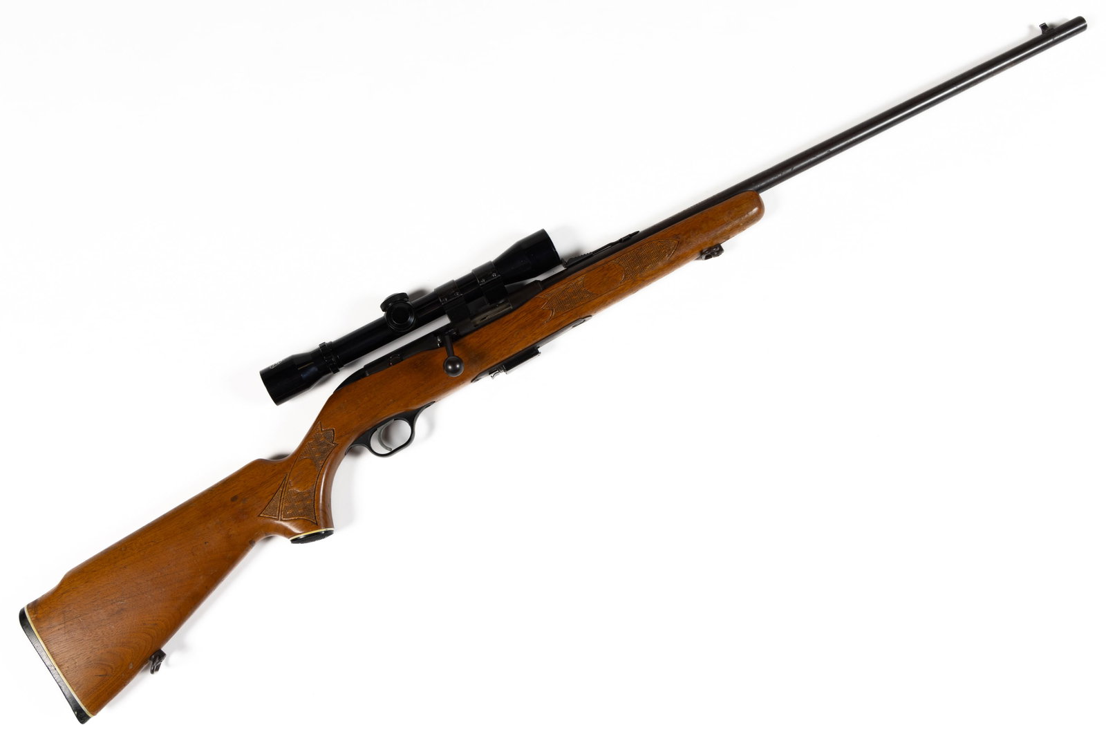MOSSBERG MODEL 640KC CHUCKSTER BOLT-ACTION RIFLE: MOSSBERG MODEL 640KC CHUCKSTER BOLT-ACTION RIFLE, 22 magnum cal., with clip, fitted with a Telstar 4x32 scope. No serial number visible. Class: Modern. FIREARMS LAWS: All firearms are sold i