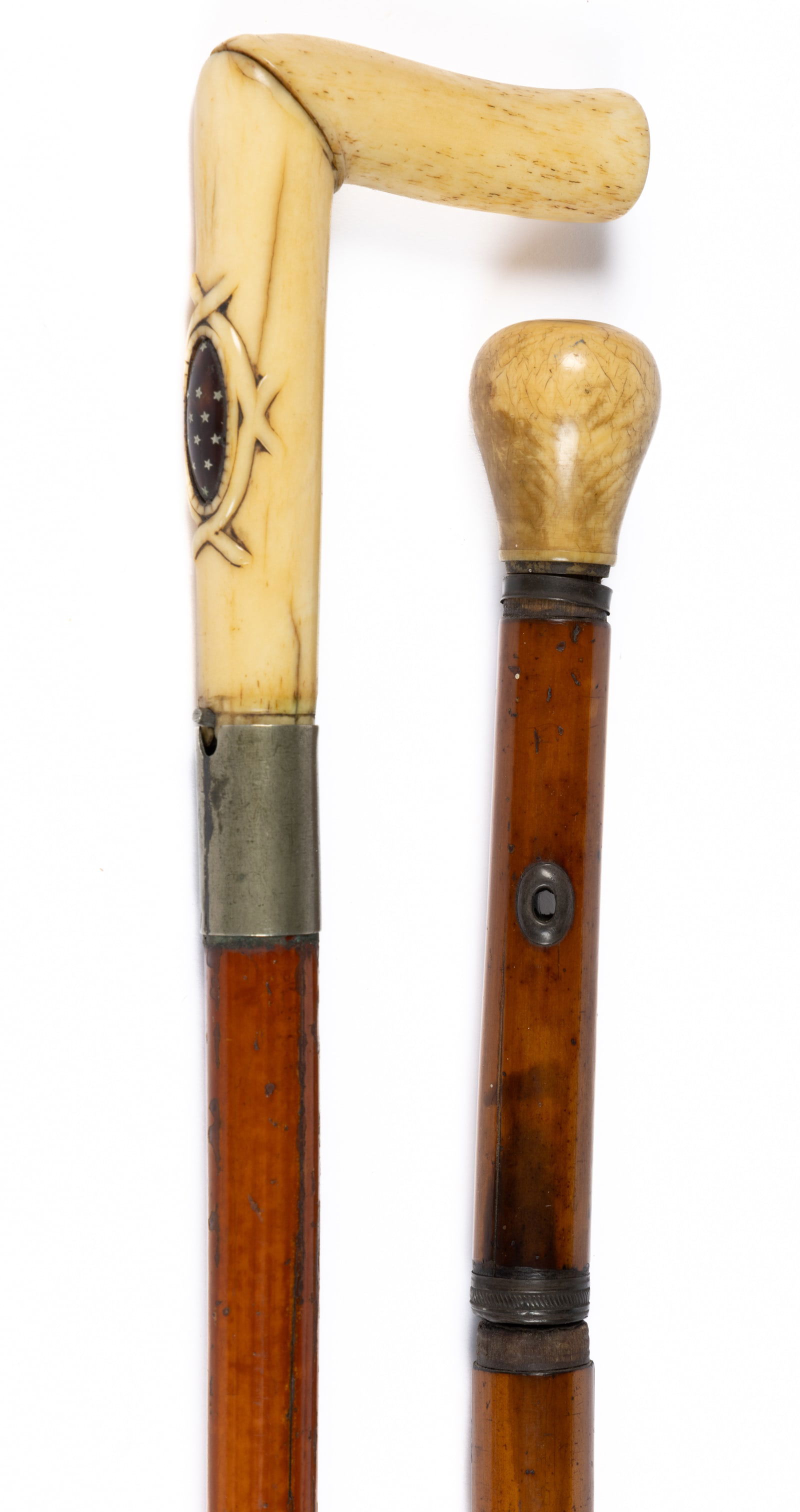 ANTIQUE SWORD CANES / WALKING STICKS, LOT OF TWO: ANTIQUE SWORD CANES / WALKING STICKS, LOT OF TWO, (1) unmarked etched blade, bone handle with shell inset inlaid with 14 German silver stars, original brass ferrule; and (2) bamboo example with triang