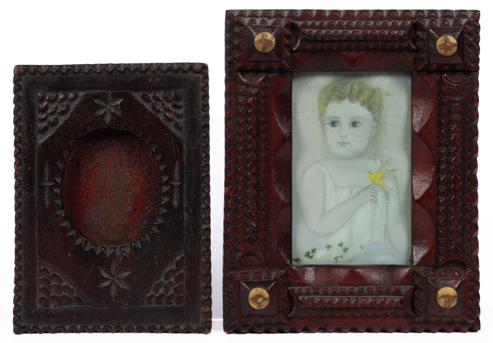 AMERICAN FOLK ART CARVED AND PAINTED FOLK / TRAMP ART FRAMES, LOT OF TWO: AMERICAN FOLK ART CARVED AND PAINTED FOLK / TRAMP ART FRAMES, LOT OF TWO, including one with a pencil drawing depicting a young figure holding a bird, no signature located. Late 19th/early 20th centur