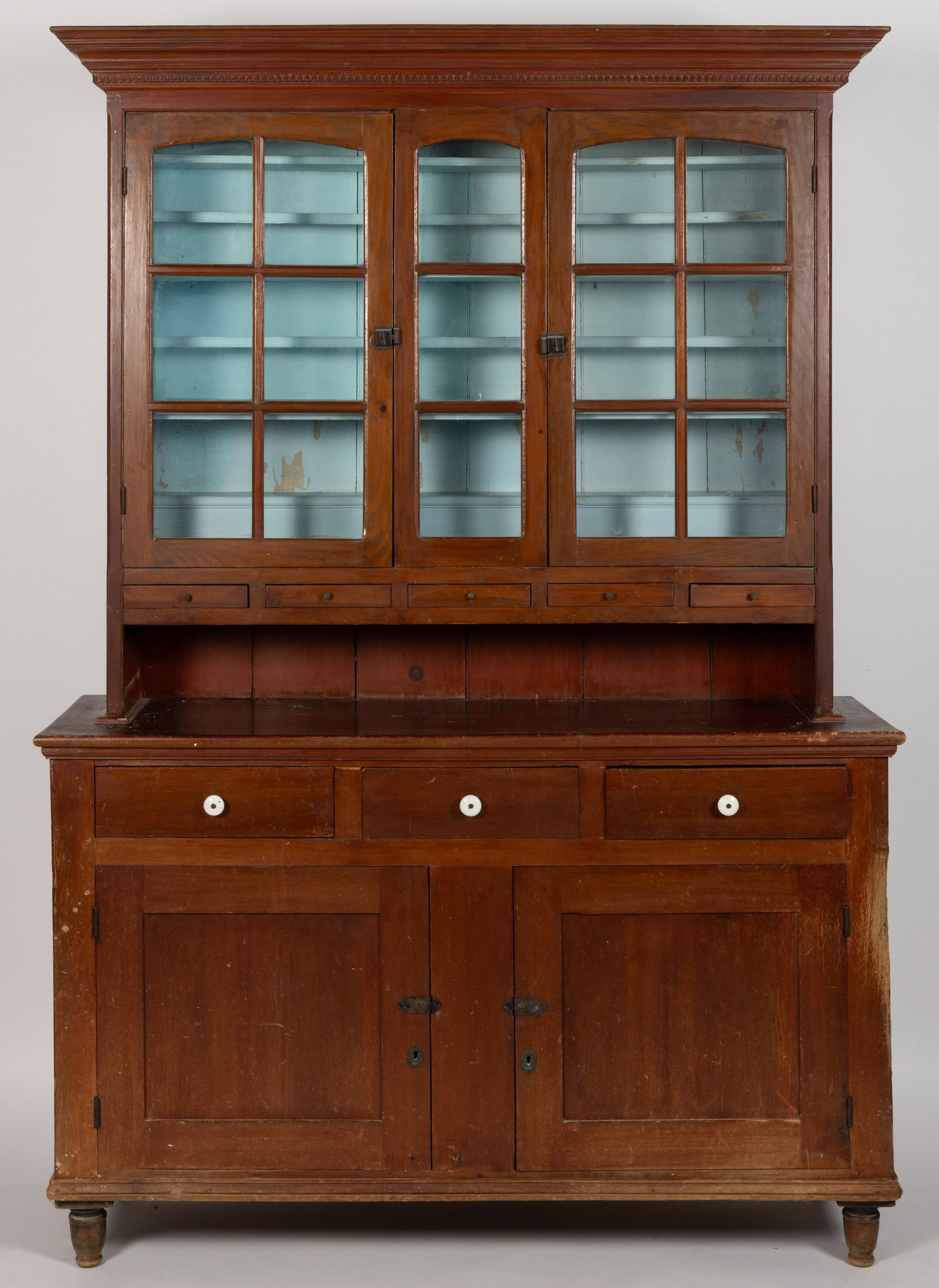 PENNSYLVANIA POPLAR STEPBACK FLATWALL "DUTCH" CUPBOARD: PENNSYLVANIA POPLAR STEPBACK FLATWALL "DUTCH" CUPBOARD, two-piece construction, the upper case featuring bold applied cornice, two hinged six-light doors over five small drawers and ope