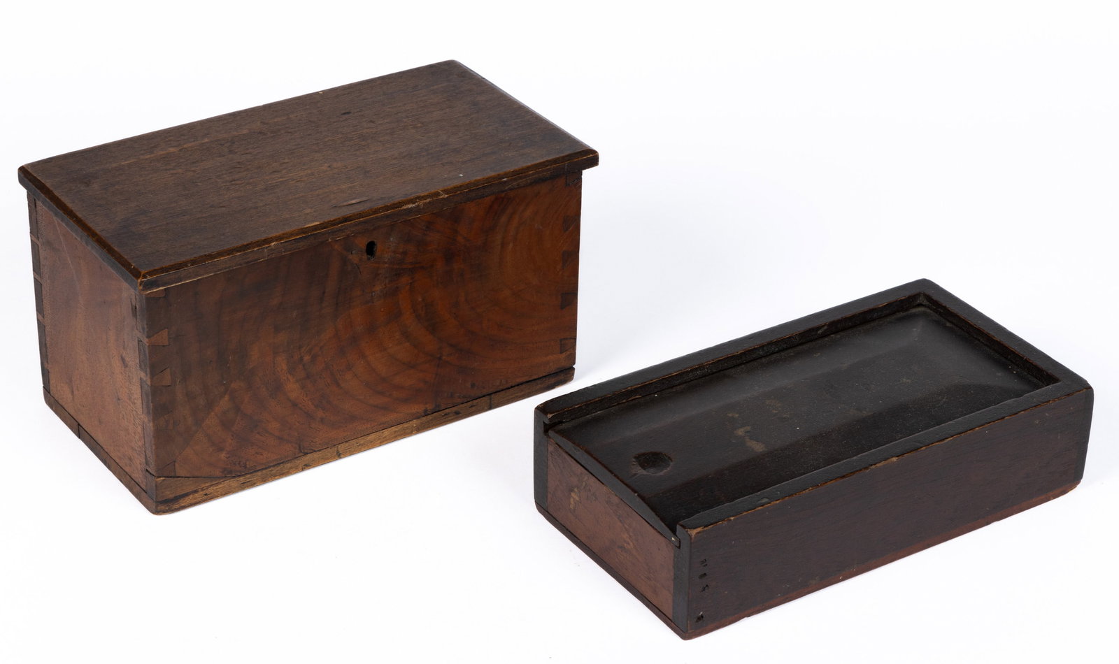 OHIO WALNUT BOXES, LOT OF TWO: OHIO WALNUT BOXES, LOT OF TWO, comprising a two-compartment slide-top box of nailed construction, signed "Jane Kindy" to interior, poplar bottom and divider; and a flame-grained miniatu