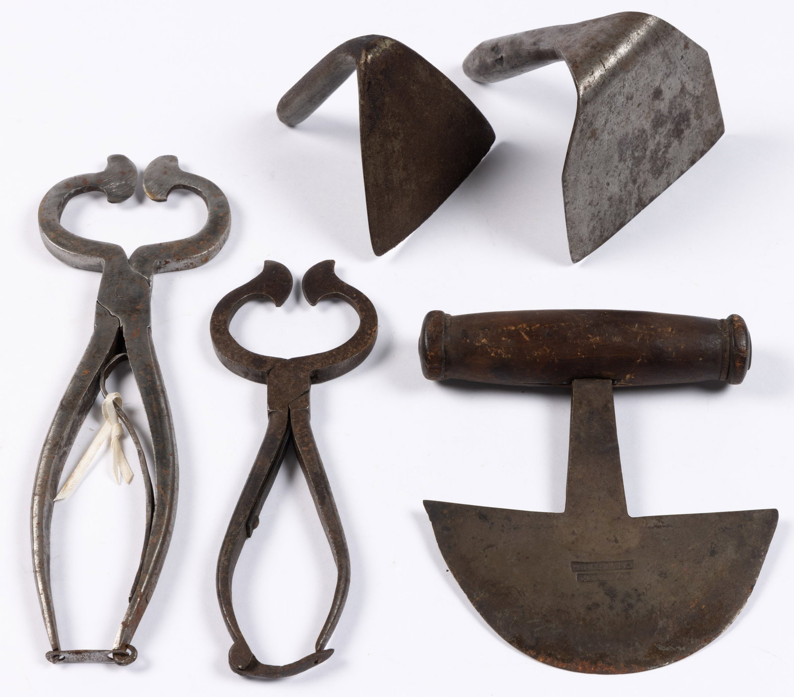 ASSORTED DOMESTIC / KITCHEN ARTICLES, LOT OF FIVE: ASSORTED DOMESTIC / KITCHEN ARTICLES, LOT OF FIVE, comprising two wrought-iron sugar nippers / tongs, dough scrapers no markings located, and a chopper stamped "WASH & CO. / CAST STEEL" 