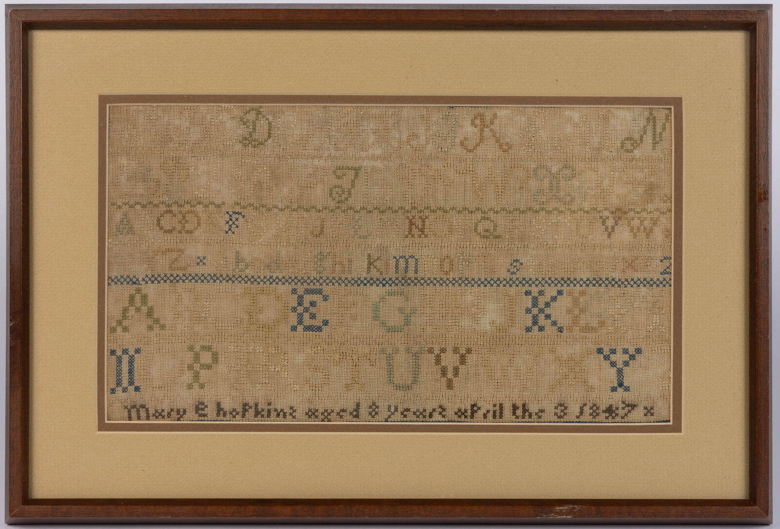 NEW ENGLAND NEEDLEWORK SAMPLERS, SET OF TWO: NEW ENGLAND NEEDLEWORK SAMPLERS, SET OF TWO, silk on linen, comprising one with six alphabet rows segmented by horizontal bands of decorative stitching, lower edge signed "Mary E hopkins aged 8 y