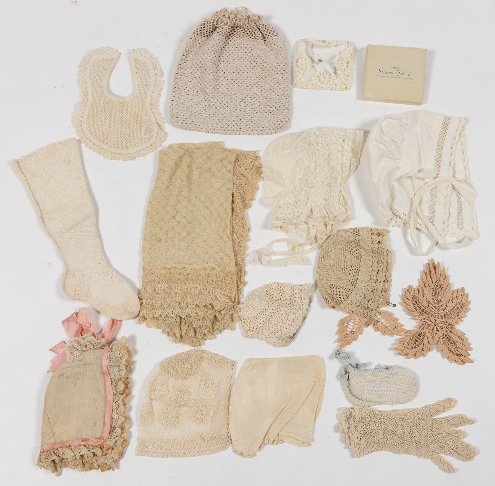ANTIQUE AND VINTAGE LACE, CROCHETED, AND OTHER TEXTILE ARTICLES, LOT OF 21: ANTIQUE AND VINTAGE LACE, CROCHETED, AND OTHER TEXTILE ARTICLES, LOT OF 21, including baby and lady's bonnets, a pair of children's stockings, a crocheted bag with drawstring top, and a "