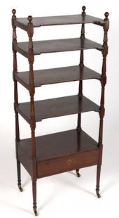 MID-ATLANTIC LATE FEDERAL MAHOGANY ETAGERE / DUMBWAITER: MID-ATLANTIC LATE FEDERAL MAHOGANY ETAGERE / DUMBWAITER, four fixed shelves with cut-out front edges, supported on turned columns graduating in size, above a single-drawer case raised on tapered ring-