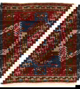 ANTIQUE CAUCASIAN SCATTER RUG: ANTIQUE CAUCASIAN SCATTER RUG, featuring single geometric medallion with animal figures springing from both sides on blue and red ground with outer border having star pattern on white ground.&nbs