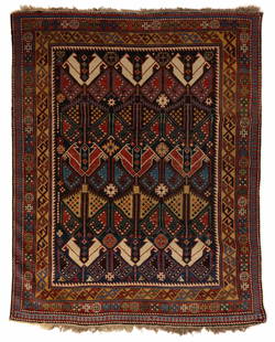 ANTIQUE CAUCASIAN SCATTER RUG: ANTIQUE CAUCASIAN SCATTER RUG, featuring stylized decorative ornaments on blue ground, flanked by yellow border with geometric designs. Late 19th/early 20th century. 45" x 57". Provenance: