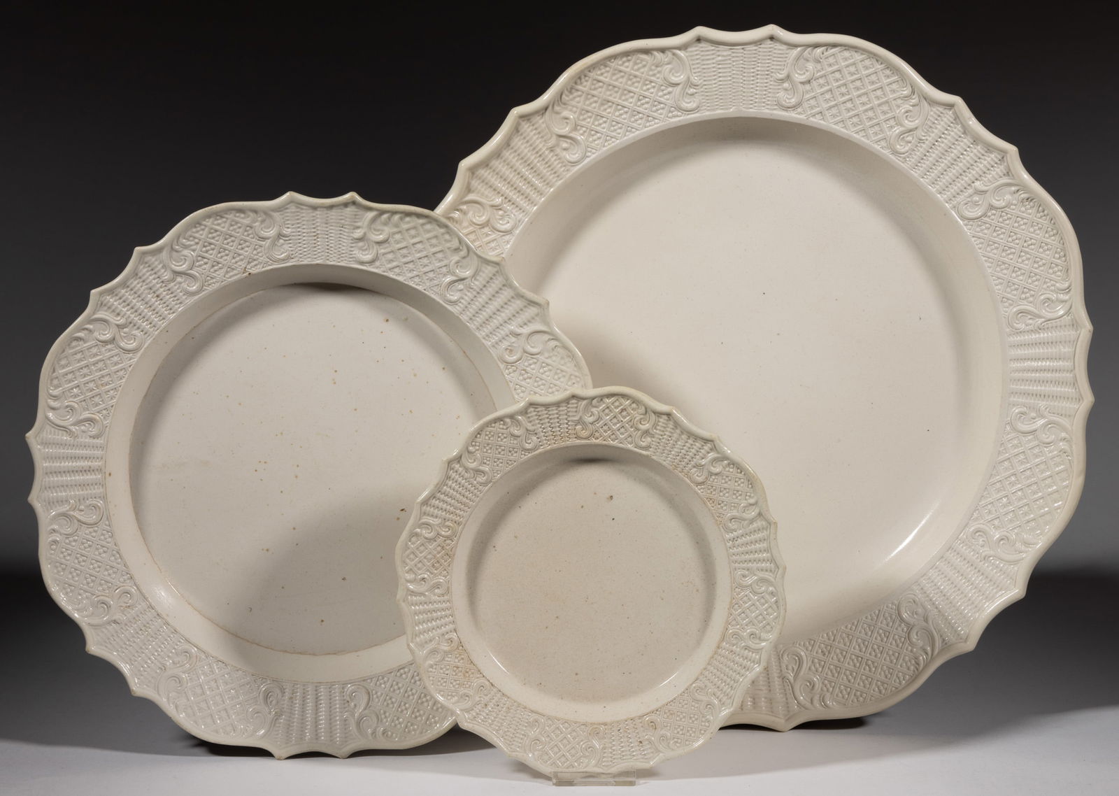 ENGLISH WHITE SALT-GLAZED STONEWARE THREE-PIECE GRADUATED PLATE SET (1 of 2)