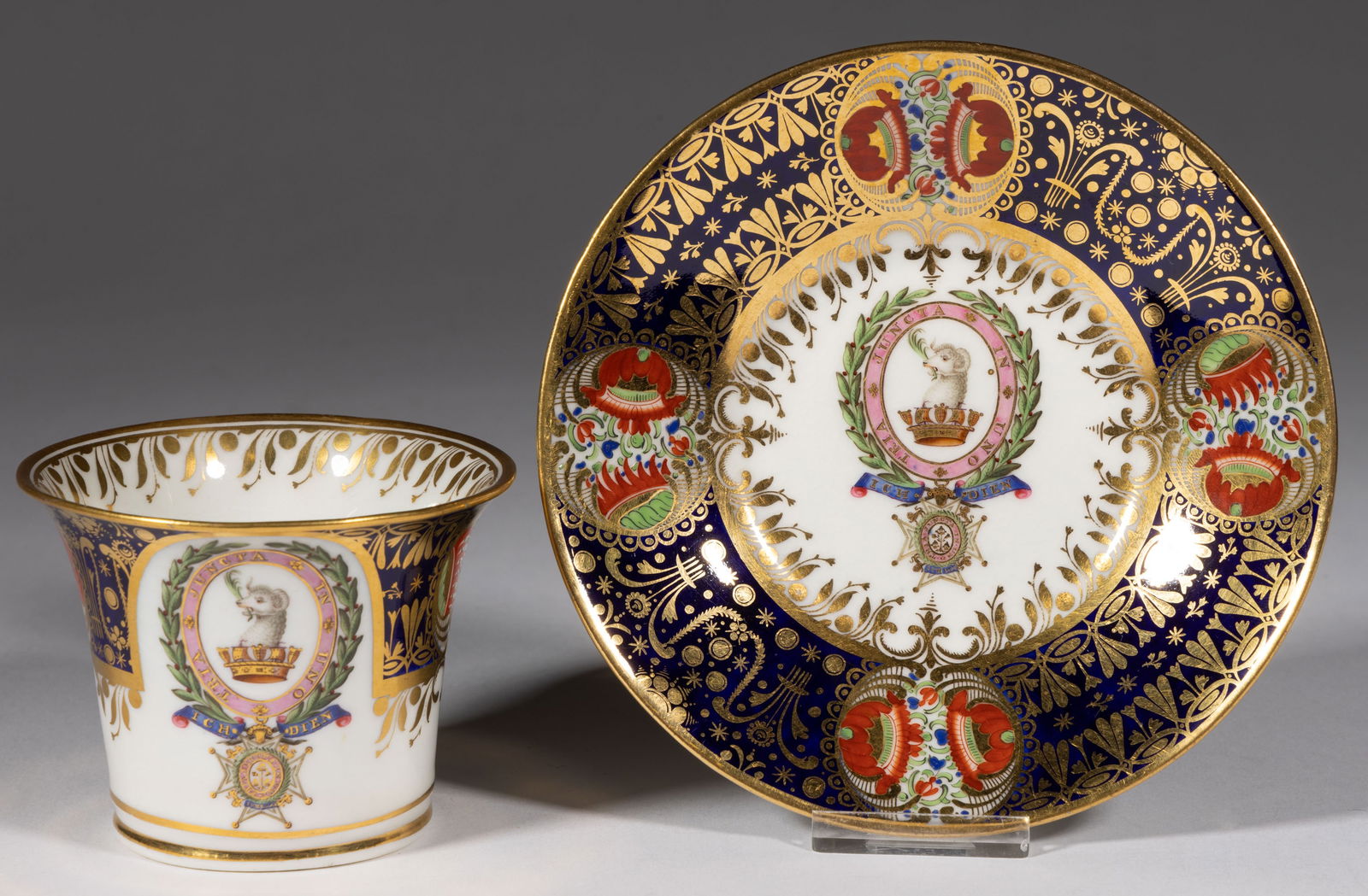 ENGLISH PORCELAIN ARMORIAL CUP AND SAUCER SET (1 of 3)