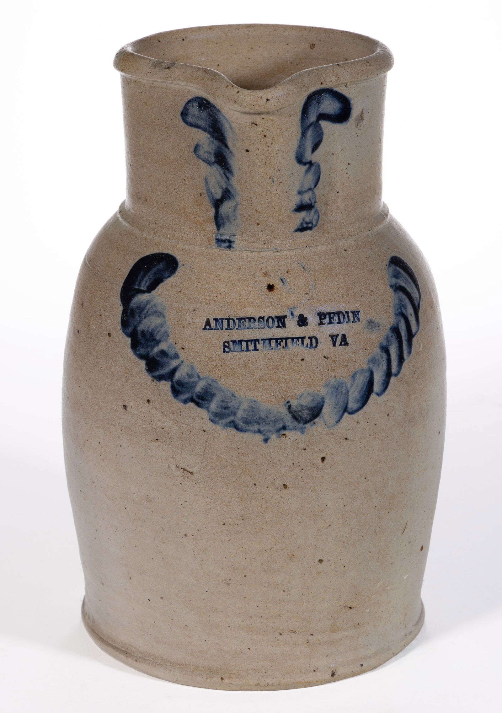STAMPED "ANDERSON & PEDIN / SMITHFIELD VA" VIRGINIA MERCHANT'S DECORATED STONEWARE PITCHER: STAMPED "ANDERSON & PEDIN / SMITHFIELD VA" VIRGINIA MERCHANT'S DECORATED STONEWARE PITCHER, salt-glazed, "1" gallon capacity mark, ovoid form with rounded rim, beaded