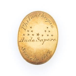 HAMPDEN-SYDNEY COLLEGE PHILANTHROPIC SOCIETY GOLD PIN: HAMPDEN-SYDNEY COLLEGE PHILANTHROPIC SOCIETY GOLD PIN, oval form with a non-gold pin fastener and hook clasp to back, front engraved "Philanthropic / Society 1807." around "Aude Sa