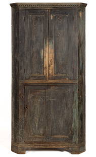 DIMINUTIVE PIEDMONT VIRGINIA CHIPPENDALE PAINTED YELLOW PINE CORNER CUPBOARD: DIMINUTIVE PIEDMONT VIRGINIA CHIPPENDALE PAINTED YELLOW PINE CORNER CUPBOARD, one piece, canted returns, the dentil-molded cornice over two hinged fielded-panel doors concealing two fixed shelves, abo