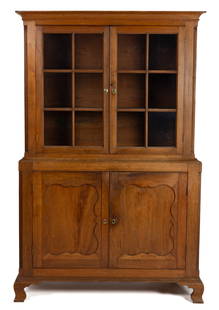 RARE ALBEMARLE CO., PIEDMONT, VIRGINIA CHIPPENDALE WALNUT WALL PRESS: RARE ALBEMARLE CO., PIEDMONT, VIRGINIA CHIPPENDALE WALNUT WALL PRESS, in two dovetailed sections, the top featuring a cove-molded cornice above two six-pane doors opening to two fixed shelves, and fla