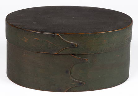 NEW ENGLAND PAINTED BENTWOOD PANTRY BOX: NEW ENGLAND PAINTED BENTWOOD PANTRY BOX, pine and oak, the classic oval covered form secured with hand-wrought tacks, retaining original dark green-painted surface. Late 18th/first quarter 1