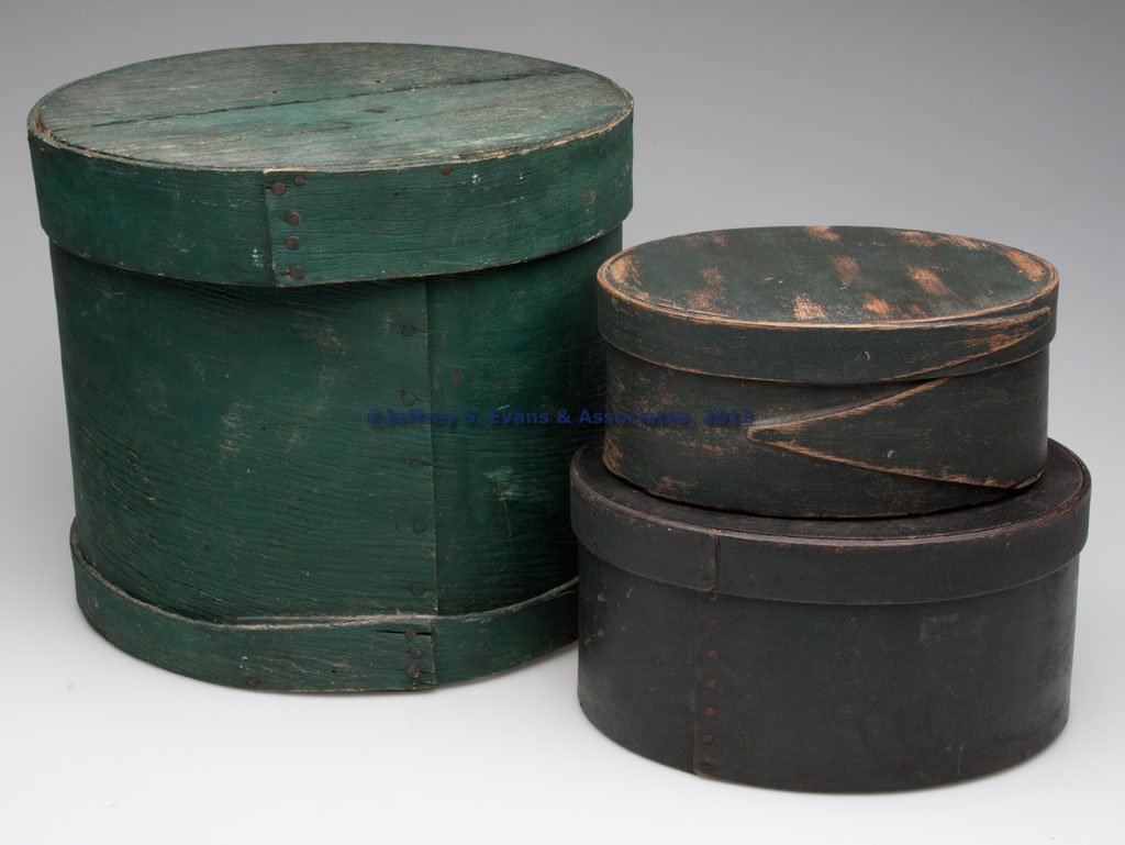 AMERICAN PAINTED BENTWOOD PANTRY BOXES, LOT OF THR: AMERICAN PAINTED BENTWOOD PANTRY BOXES, LOT OF THREE, each circular form with tacked lap construction. Green-painted surfaces. Second half 19th century. 3 1/4" to 9 3/4" H, 8" to 11 1/4" D. Provenance