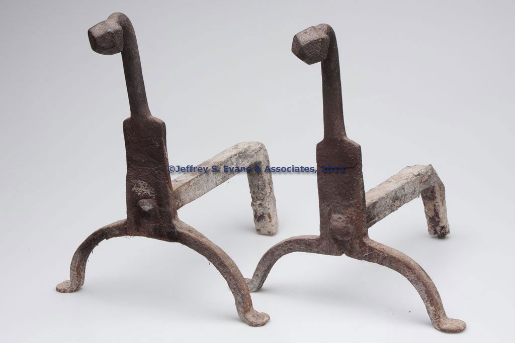 PAIR OF SHENANDOAH VALLEY OF VIRGINIA WROUGHT-IRON: PAIR OF SHENANDOAH VALLEY OF VIRGINIA WROUGHT-IRON ANDIRONS, each featuring a wide bladed shaft supporting a rounded neck and forward tipped facetted finial, raised on arched legs and penny feet. Orig