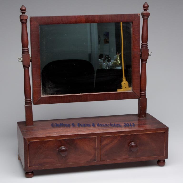 AMERICAN SHERATON MAHOGANY DRESSING MIRROR: AMERICAN SHERATON MAHOGANY DRESSING MIRROR, two half-length drawers. Pine secondary wood. Original mirror plate and knobs. Second quarter 19th century. 19 1/4" H, 17 1/4" W. Provenance: Collection of 