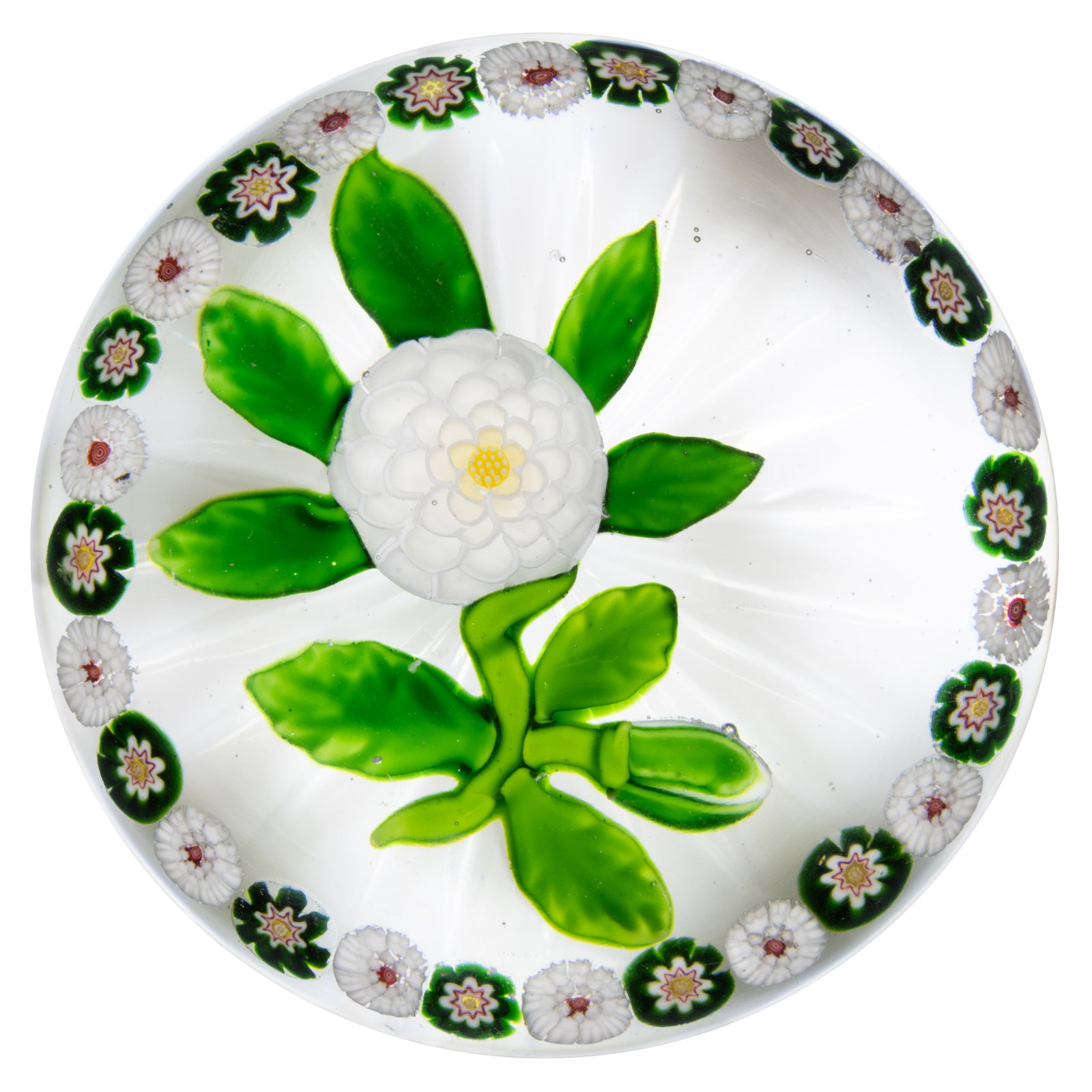 ANTIQUE BACCARAT CAMOMILE AND GARLAND LAMPWORK AND MILLEFIORI ART GLASS PAPERWEIGHT: ANTIQUE BACCARAT CAMOMILE AND GARLAND LAMPWORK AND MILLEFIORI ART GLASS PAPERWEIGHT, central all white camomile blossom with a yellow stamen, five green leaves protruding from the underside, raised on