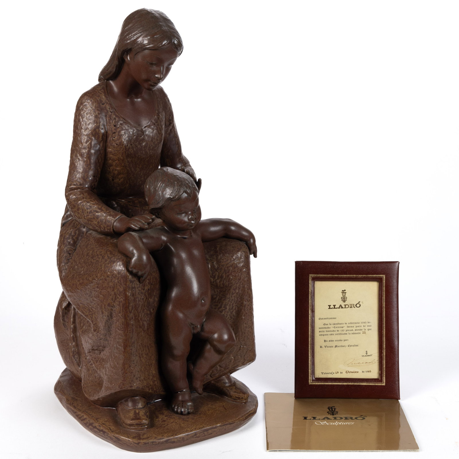SPANISH LLADRO CERAMIC ADORATION SCULPTURE: SPANISH LLADRO CERAMIC ADORATION FIGURAL GROUP, gres finish, limited edition #52 of 150, depicting a seated mother with nude child, resting on an ovoid base, incised to top of base "V. Martinez&q