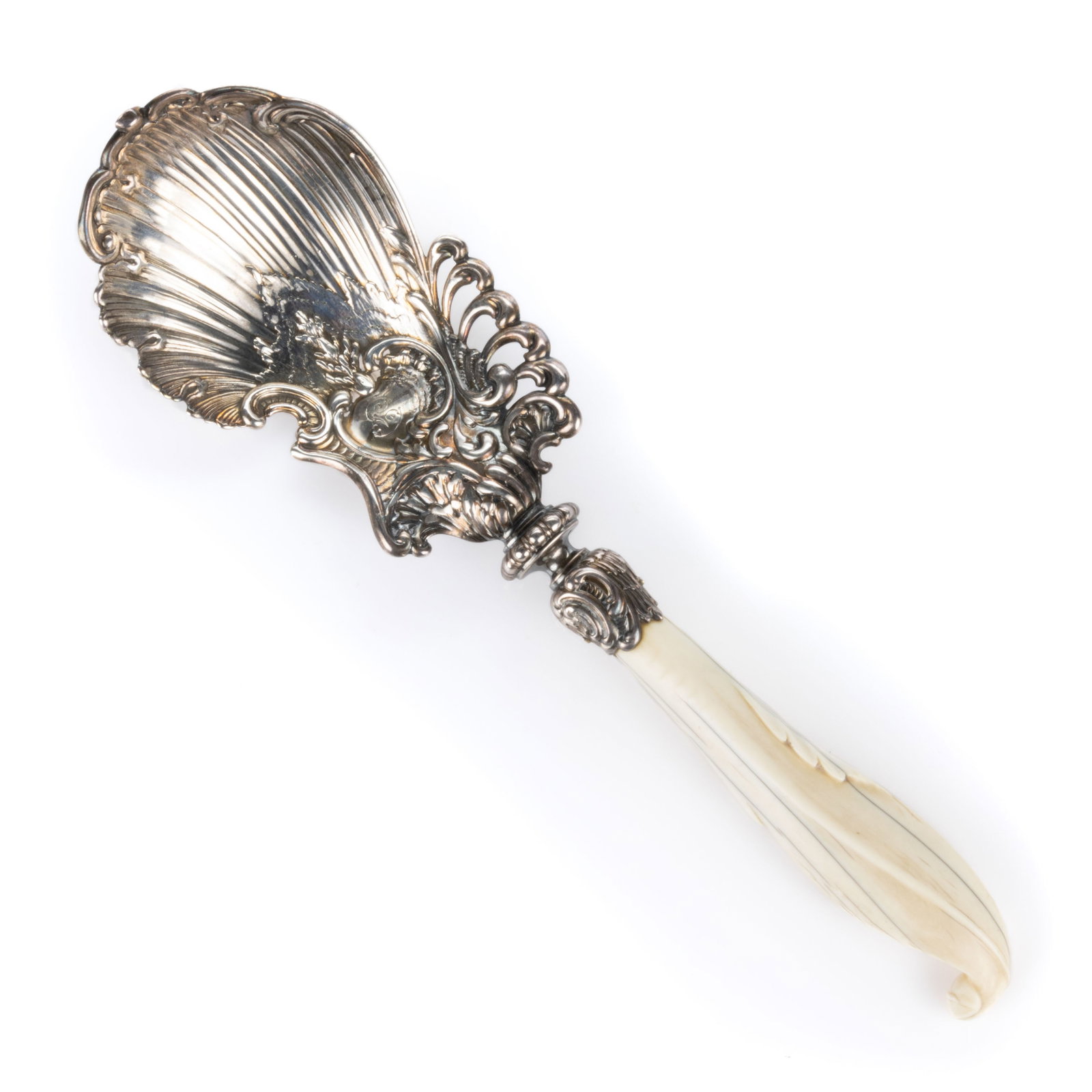 GORHAM ROCOCO-STYLE STERLING SILVER AND BONE-HANDLED SERVING SPOON: GORHAM ROCOCO-STYLE STERLING SILVER AND BONE-HANDLED SERVING SPOON, ornate sterling silver top featuring a shell bowl with scrolled designs, center with engraved "P" initial, on a carved bon