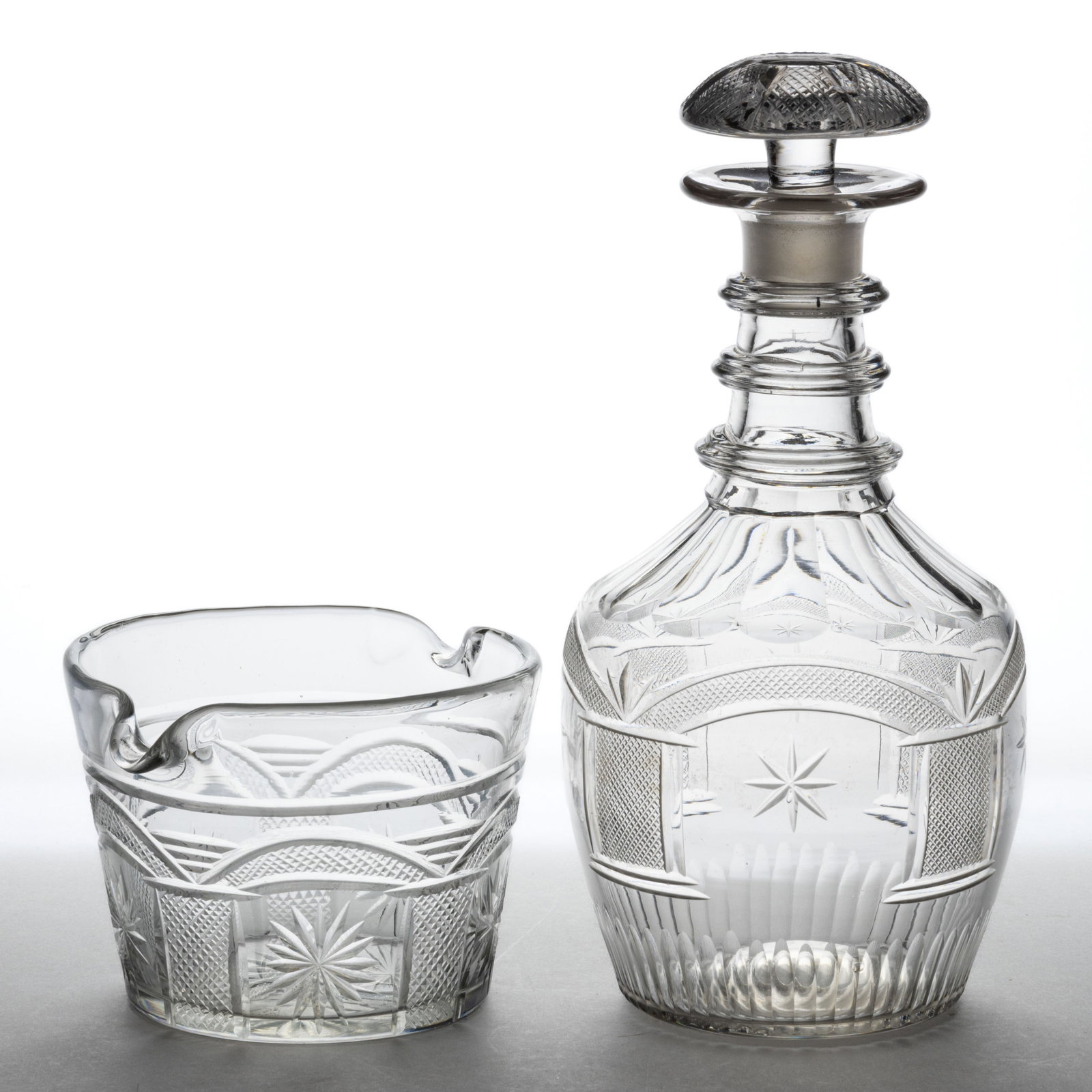 CUT MASONIC GLASS ARTICLES, LOT OF TWO: CUT MASONIC GLASS ARTICLES, LOT OF TWO, colorless lead glass, comprising a quart decanter with three applied neck rings and cut cuts to the shoulder, period mushroom stopper, and a wine rinser wi