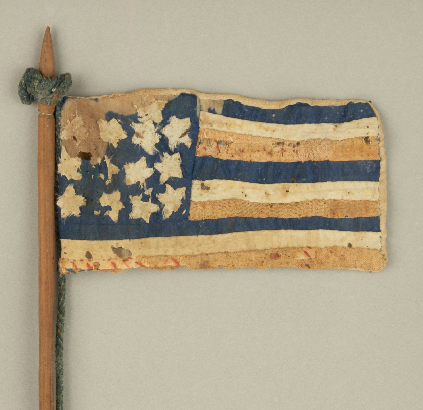 VERY RARE CIVIL WAR CONFEDERATE HAND-SEWN BIBLE FLAG WITH TEXAS ASSOCIATION: VERY RARE CIVIL WAR CONFEDERATE HAND-SEWN BIBLE FLAG WITH TEXAS ASSOCIATION, wool and linen, the canton featuring 13 single-appliqued five-pointed stars, the fly with nine stripes alternating blue, wh