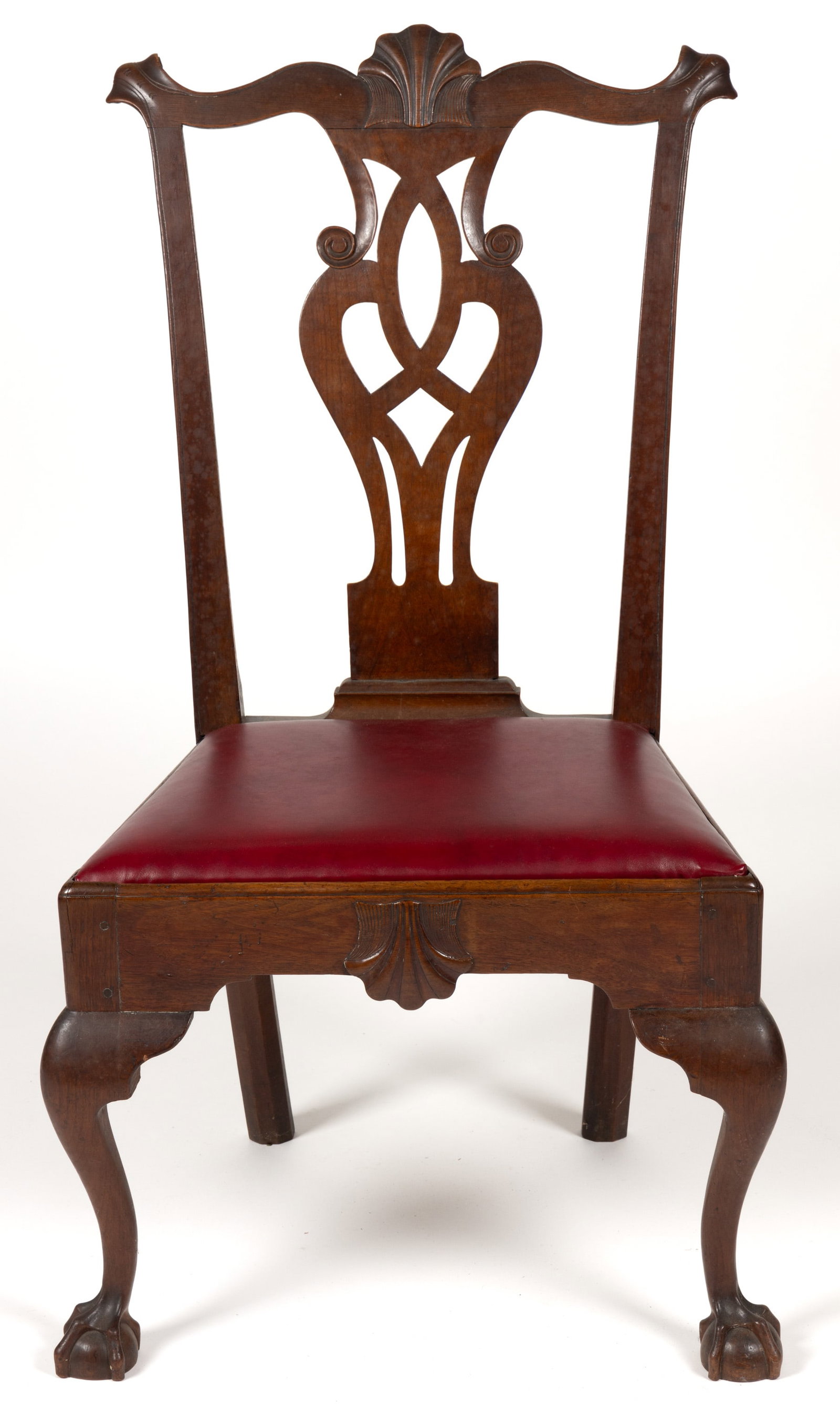 PHILADELPHIA, PENNSYLVANIA CHIPPENDALE CARVED MAHOGANY SIDE CHAIR: PHILADELPHIA, PENNSYLVANIA CHIPPENDALE CARVED MAHOGANY SIDE CHAIR, featuring shell-carved serpentine crest rail with rolled ears, pierced baluster-form splat, and trapezoidal seat frame with pendant s