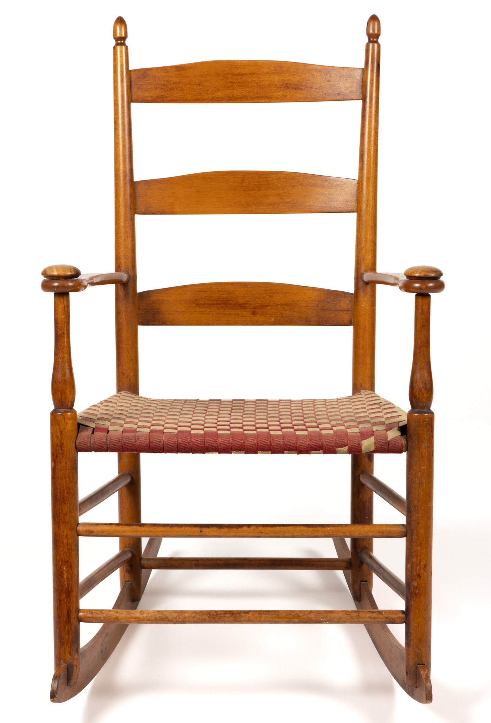 SIGNED SHAKER, MT. LEBANON, NEW YORK NO. 3 ARM ROCKER: SIGNED SHAKER, MT. LEBANON, NEW YORK NO. 3 ARM ROCKER, maple, the three-slat back above shaped arms with mushroom caps, and an early red and cream wool-tape woven seat. Gilt-stenciled stamp insid