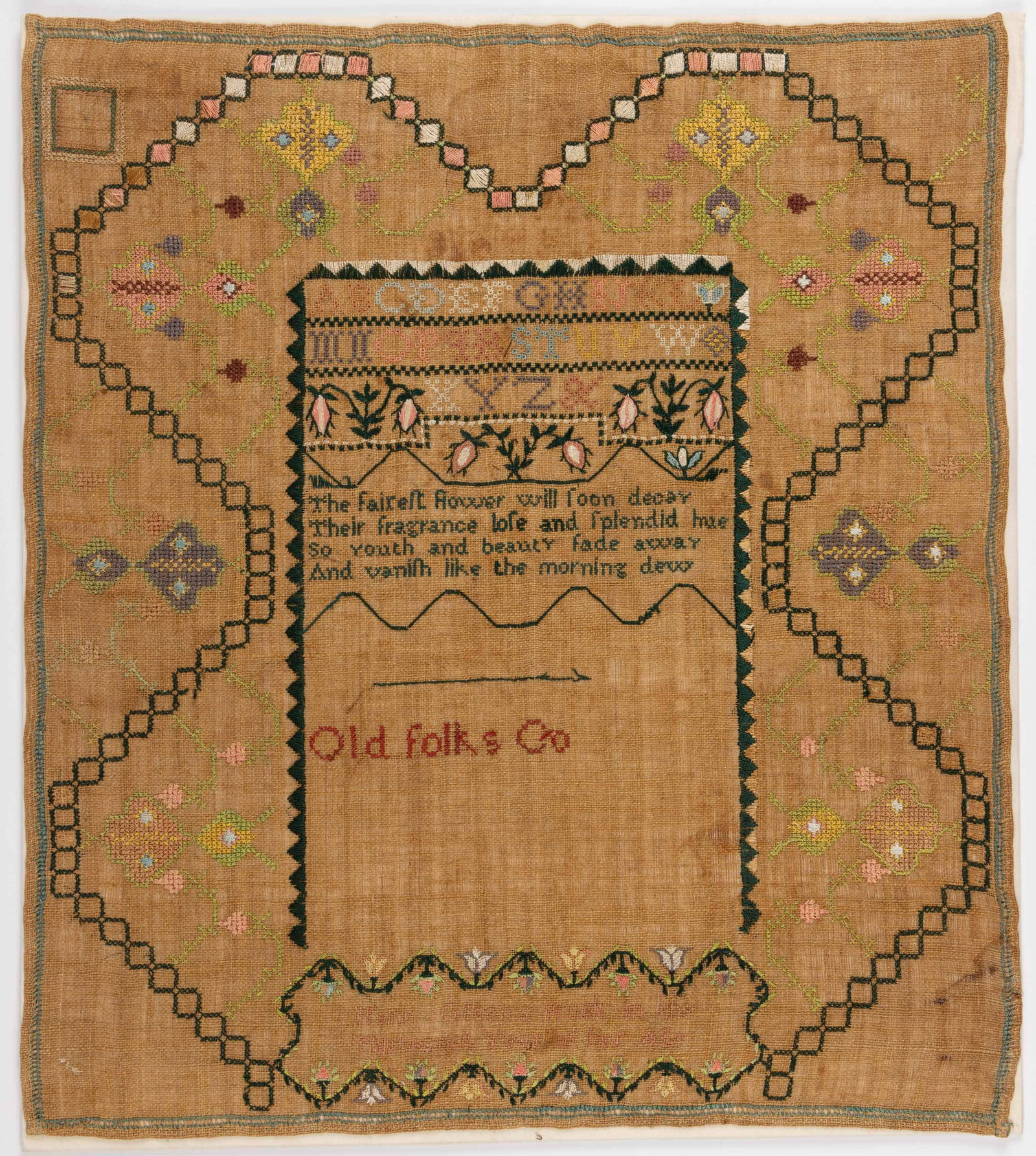 MIDDLESEX CO., MASSACHUSETTS NEEDLEWORK SAMPLER: MIDDLESEX CO., MASSACHUSETTS NEEDLEWORK SAMPLER, silk on linen, unfinished, center with two and one-third alphabet rows above three floral motifs and a four-line verse, lower half unfinished with &quo