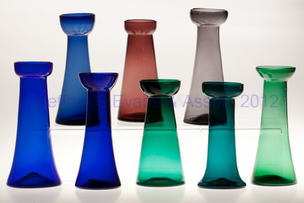 BLOWN AND MOLDED HYACINTH VASES, LOT OF EIGHT: BLOWN AND MOLDED HYACINTH VASES, LOT OF EIGHT, various colors, each of tall conical form with rough pontil mark. Late 19th/early 20th century. 7 1/2" to 9" H. Provenance: From the collection of Ann Ba