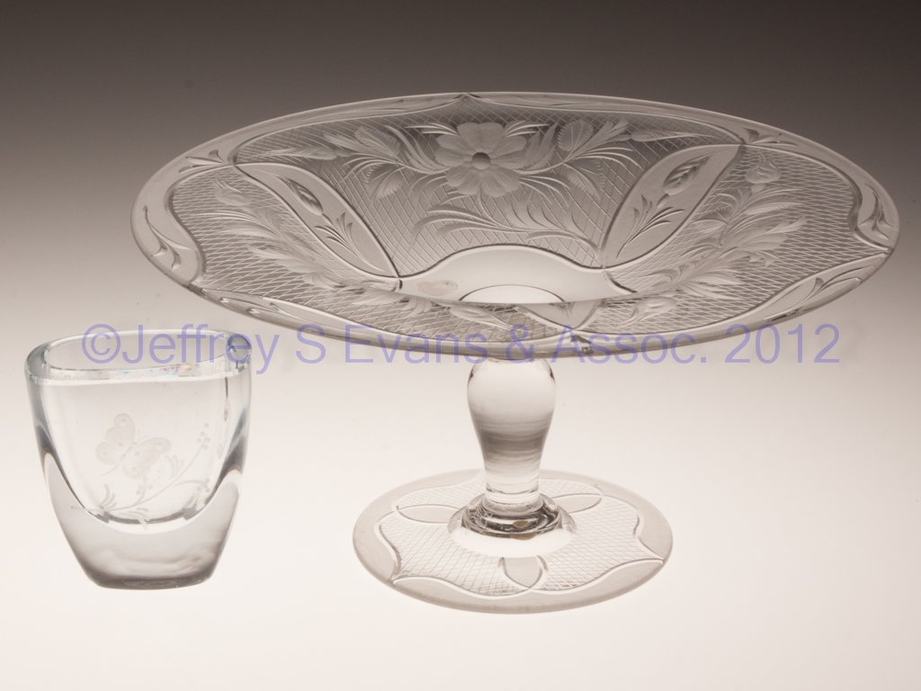 PAIRPOINT CUT GLASS COMPORT: PAIRPOINT CUT GLASS COMPORT, colorless, Victoria pattern on an #A-228 blank, polished pontil mark. Along with a small engraved vase with illegible signature. Two pieces total. First half 20th century.
