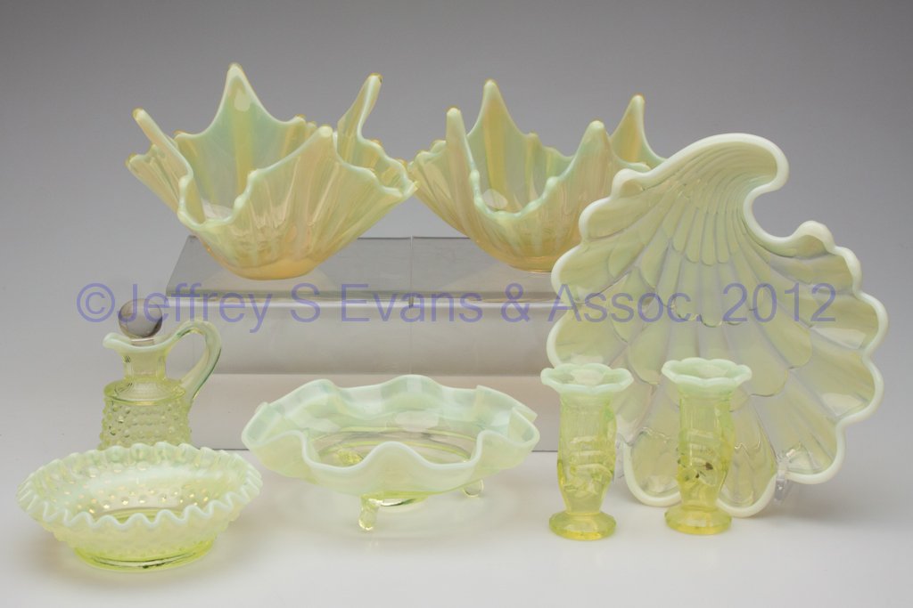 ASSORTED VASELINE OPALESCENT GLASS ARTICLES, LOT O: ASSORTED VASELINE OPALESCENT GLASS ARTICLES, LOT OF EIGHT, including Fostoria Heirloom, Fenton Hobnail and Duncan & Miller Sanibel. 20th century. Tray 7 3/4" x 8 1/2". Provenance: From a Michigan esta