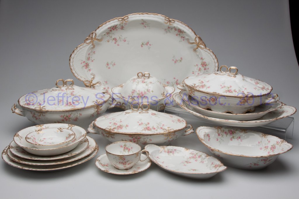 HAVILAND LIMOGES DINNER SERVICE: HAVILAND LIMOGES DINNER SERVICE, polychrome floral and gilt decoration, 102 pieces, comprising twelve each 9 3/4" plates, 9" plates, 8" plates, soup plates, fruit bowls, and butter pats, eight cup-and