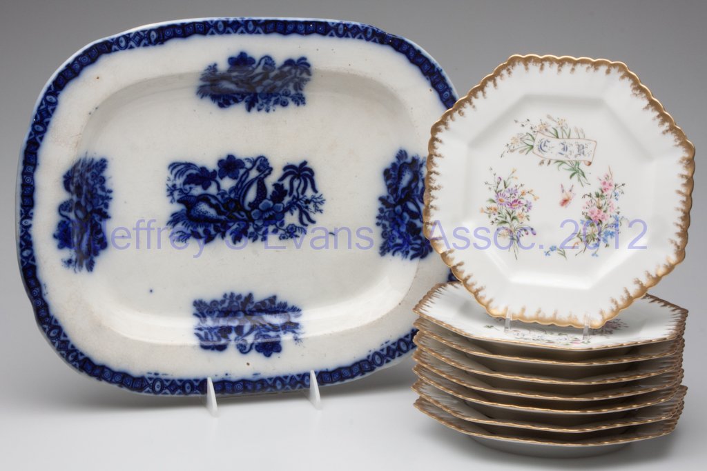 ASSORTED CERAMIC DINNERWARE, LOT OF NINE: ASSORTED CERAMIC DINNERWARE, LOT OF NINE, comprising an English flow blue platter with illegible impressed mark, and a set of eight unmarked French porcelain plates hand-painted with different insects