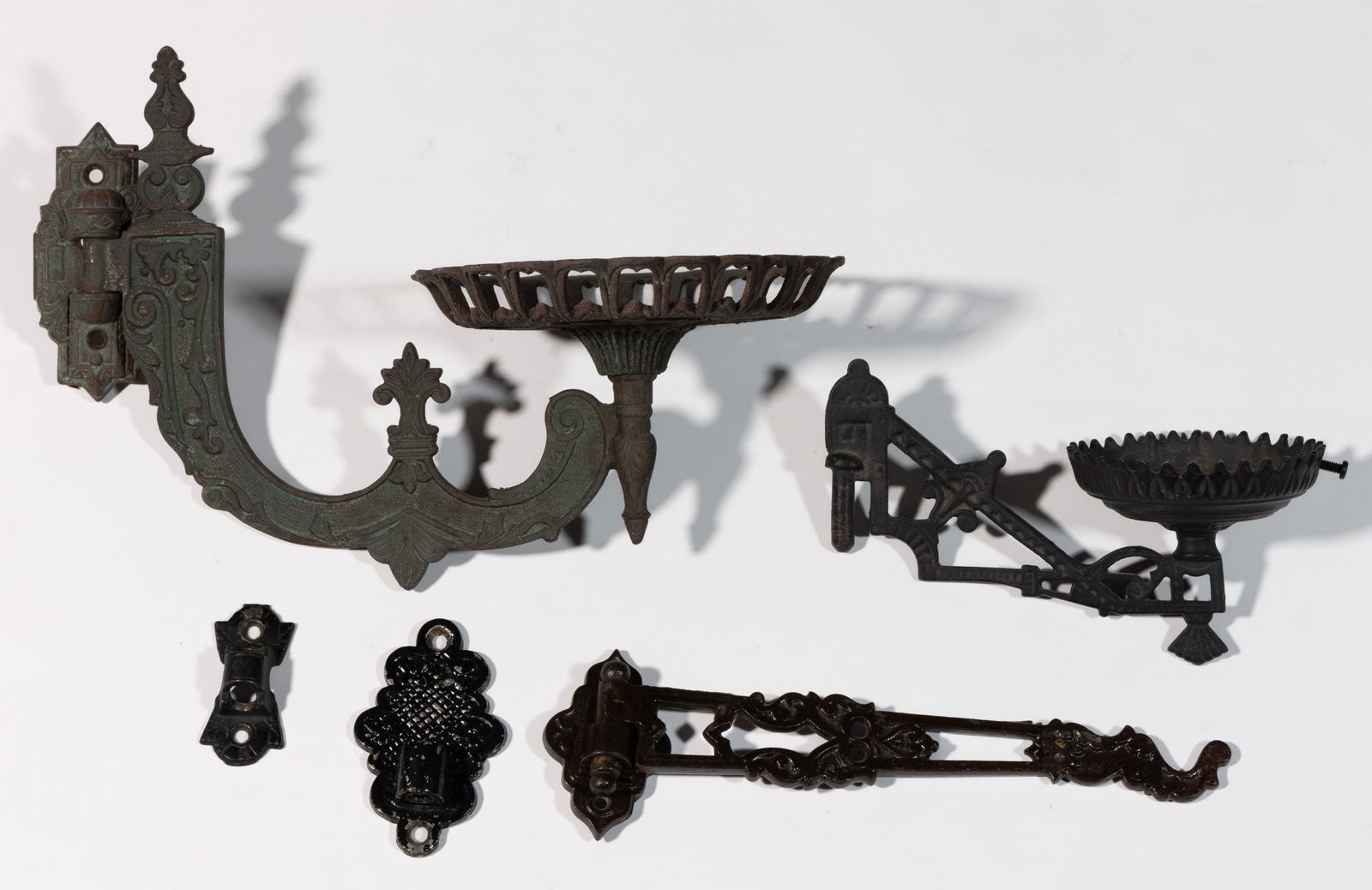 ASSORTED CAST-IRON BRACKET LAMP PARTS, LOT OF FIVE (1 of 1)